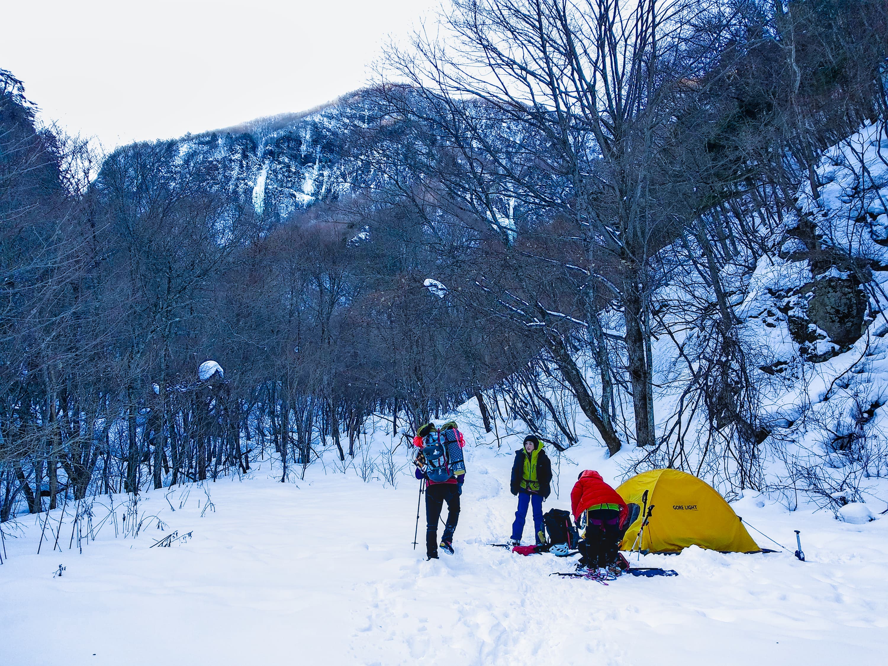 Bivouac with icefalls in the background